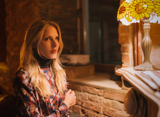 Portrait of beautiful young woman. Selective focus. High ISO shot.