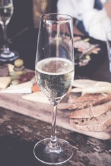 Close up of a glass of champagne in cafe, Bali island, Indonesia.