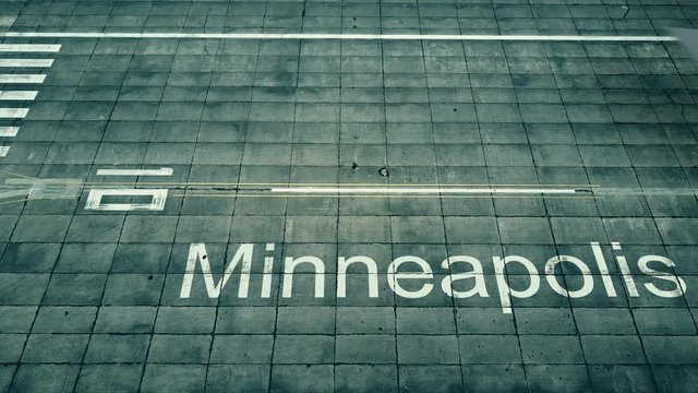 Aerial view of big airplane arriving to Minneapolis airport. Travel to the United States conceptual intro animation