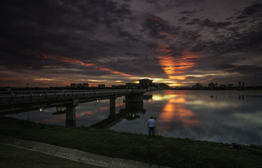 Obraz na płótnie Canvas scenery of sunset at putrajaya lake.soft focus,motion blur due to long exposure