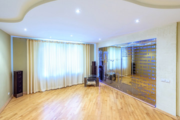 White apartment interior design living room with white leather furniture and tv audio set, modern style in chisinau, buiucani district, moldova