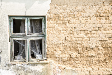 old worn house on the village