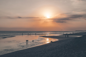 Sunset over a sea coast on Bali island, Indonesia.