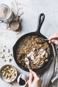 Teff skillet blondie with ice cream and chocolate drizzle