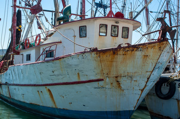 docked fishing boat - 163811027