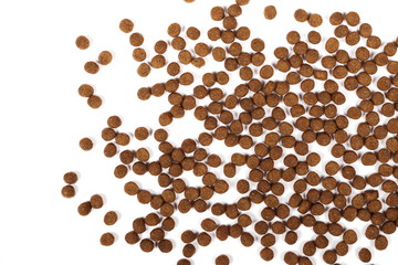 Dry dog food isolated on white background, top view