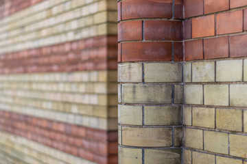 Red and yellow brick wall texture, shallow depth of field