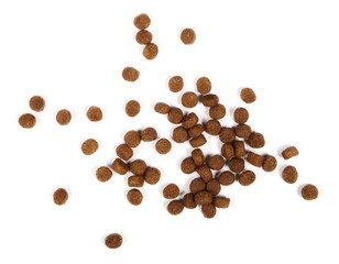 Dry dog food isolated on white background, top view