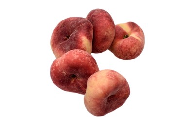 Sweet sweet flat peaches isolated on white background