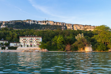 Naklejka premium View of the buildings and big rock hills in Balchik city on black sea coast in Bulgaria at gold sunset time