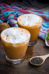 thai tea milkshake beverage thailand style and dessert on wood table