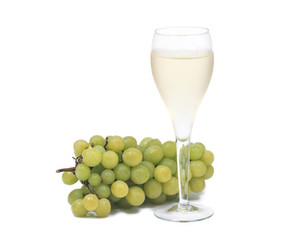 Glass of white wine and ripe organic green grapes isolated on white background