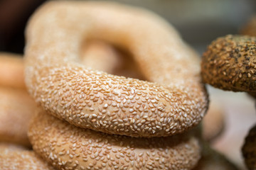 Macro shot of fresh sesame bagels at the city market