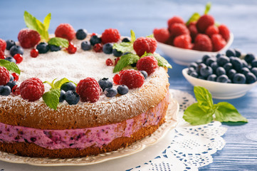 Delicious homemade cake with berry cheese cream.