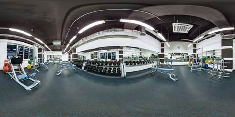 Big modern fitness gym with dumbbells weights and other sport equipment full 360 degree panorama in equirectangular spherical projection