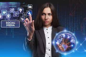 The concept of business, technology, the Internet and the network. A young entrepreneur working on a virtual screen of the future and sees the inscription: Social media