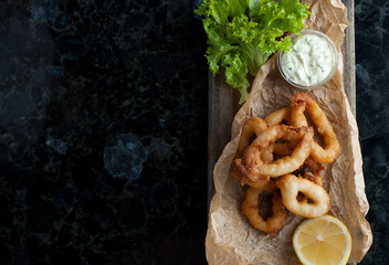 Fried squid rings in breading
