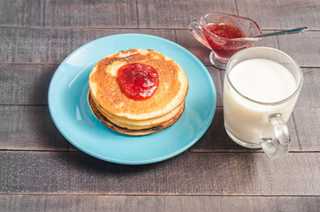 Small pancakes on a blue plate