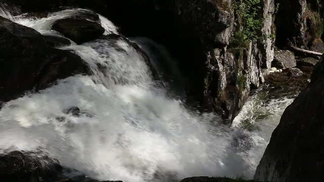 Waterfall on the river Zhigalan. The Kvarkush Range in the North of the Ural Mountains