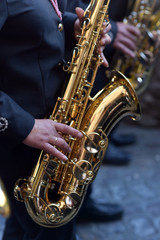 Young man playing the saxophone, Holy Week, Granada, Spain