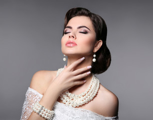 Beauty bride makeup. Elegant fashionable woman portrait. Retro hair style. Brunette model with...