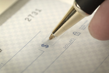 Signing a Check for Personal Finances