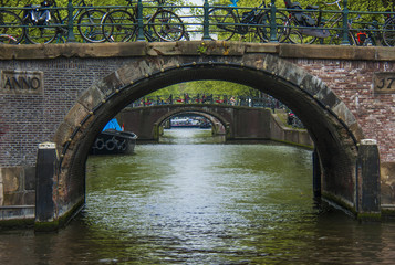 Old bridge and channel in Amsterdam, Netherlands