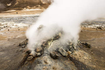 Natural Hot Springs geyser in Iceland with Steam