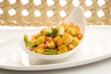 Indian Cottage Cheese Cooked with Peas