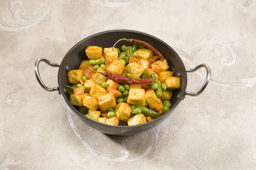 Indian Cottage Cheese Cooked with Peas