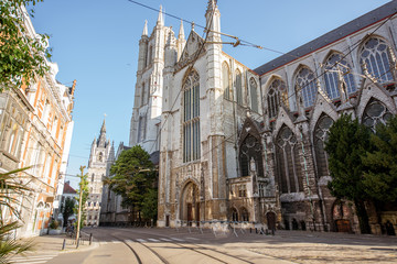Street view with saint Bavo cathedral during the morning light in Gent city, Belgium