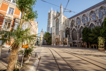 Street view with saint Bavo cathedral during the morning light in Gent city, Belgium