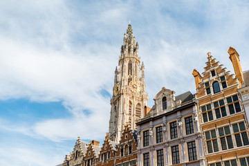 View on the beautiful buildings with the church tower in the center of Antwerpen city in Belgium