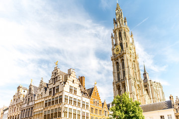 Fototapeta na wymiar View on the beautiful buildings with the church tower in the center of Antwerpen city in Belgium