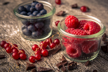 berries in glass on wood horizontal