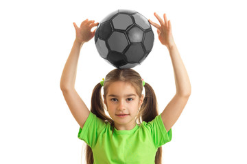 cute little young girl with soccer ball