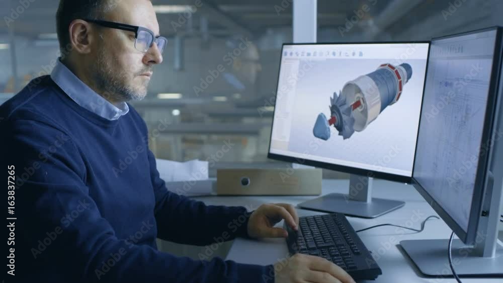 Poster chief male engineer working on big technical project creating 3d turbine/ engine model on his person