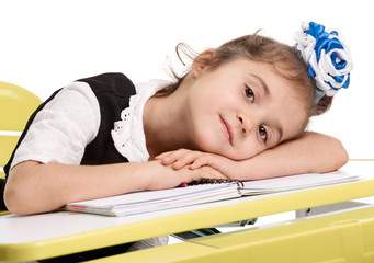 Tired schoolgirl resting