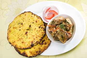 Soya Chaap Cooked in a Creamy Sauce with Missi Roti
