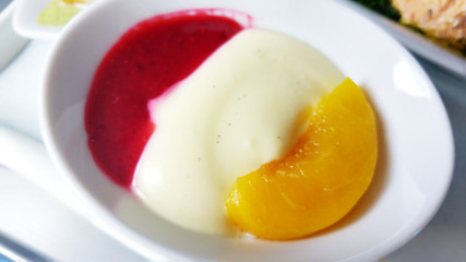 Pudding in white plate. Top view