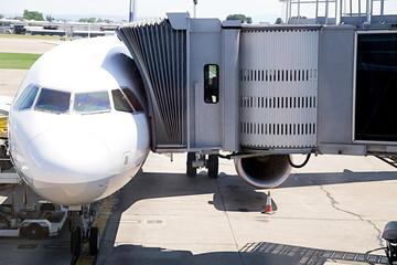 Boarding bridge docked with aircraft