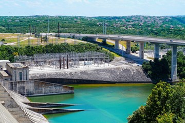 The lower section of the dam on Lake Travis in Texas shows they are producing electricity.