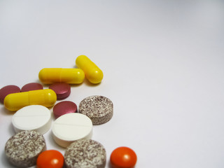 Tablets pills heap color mix therapy drugs doctor flu antibiotic pharmacy medicine medical
