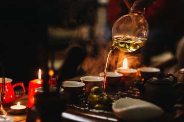 Tea ceremony. Hot chinese tea with tea desk