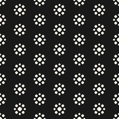 Fototapeta na wymiar Abstract dotted seamless pattern. Simple floral geometric shapes. Vector monochrome circles texture. Stippling background. Repeat tiles. Dark design for prints, decor, fabric, covers, digital, web