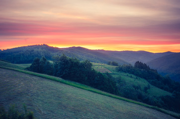 Moments before sunrise in cloudy Carpathian mountains, Poland