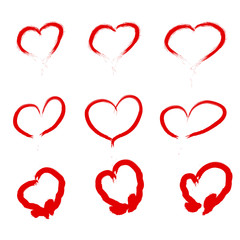 Set Of Scribbled Hearts. Vector grunge style icons collection. Vector illustration of the brush hand drawn sketchy hearts on the white background.