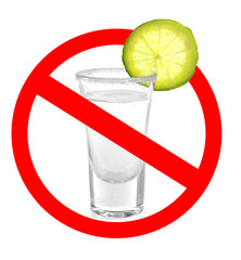 Tequila shot with juicy lime slice and salt on white background