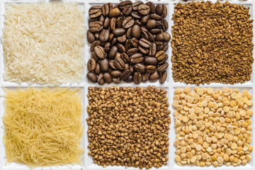 Grocery set of food products: rice, roasted coffee beans, freeze-dried instant coffee, vermicelli, buckwheat, dried peas.
