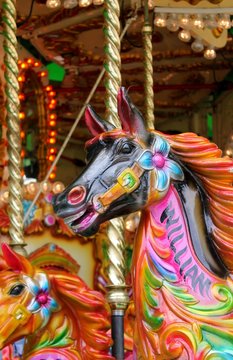 Merry go round carousel merry-go-round painted horses ride - Stock Photo image picture photograph 